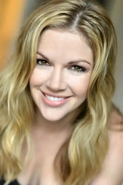 Corri English headshot