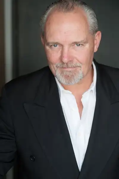 Jake T. Roberts headshot